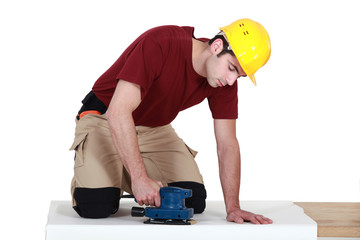 craftsman covering a board