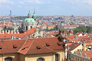 Fototapeta premium Spring Prague with St. Nicholas' Cathedral, Czech Republic