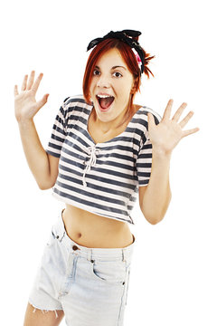 Happy young woman surprised on white background