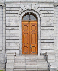 steps leading to wooden double doors