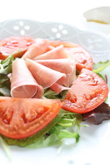 sliced tomato and ham salad