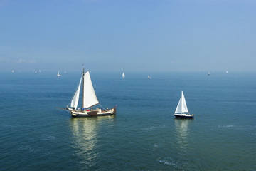 Fototapeta premium Seascape with big and small sailboats