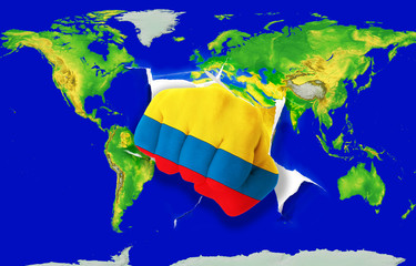 Fist in color  national flag of columbia    punching world map