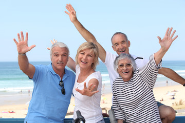 group of senior people on the beach