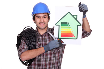 electrician holding an energy consumption label