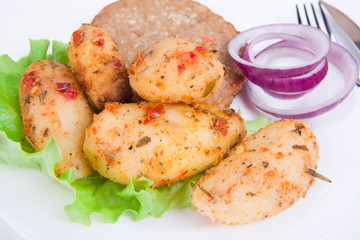Boiled Potatoes and beef green salad leaves