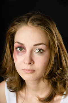 woman victim of domestic violence and abuse. on dark background