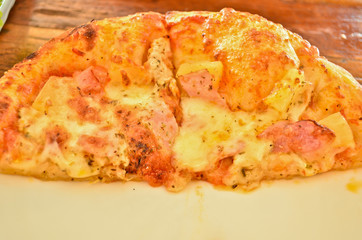 delicious hawaiian rustic style pizza made with fresh pineapples