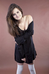 Beautiful girl on brown background