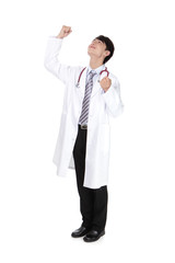 Excited young doctor rise his arm