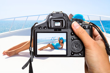 Vacations on the yacht cruise with camera