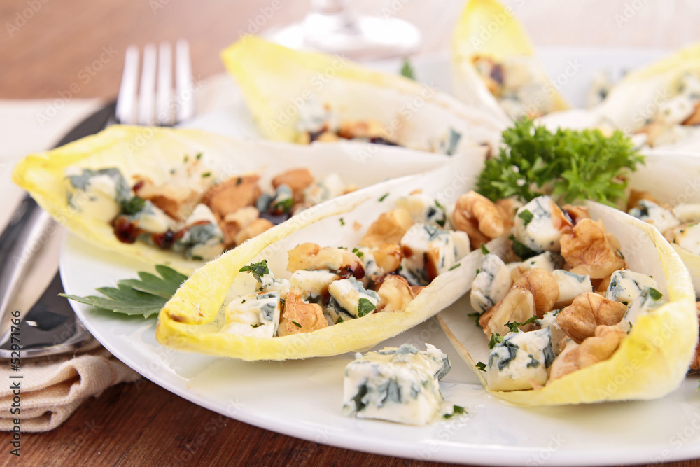 Sticker chicory boats with cheese, walnut and honey