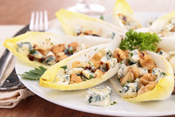 chicory boats with cheese, walnut and honey