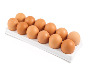 Dozen of eggs in a case isolated