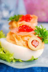eggs with smoked salmon and red caviar