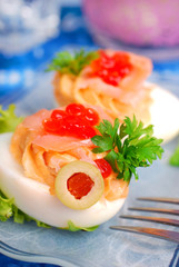 eggs with smoked salmon and red caviar
