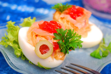 eggs with smoked salmon and red caviar