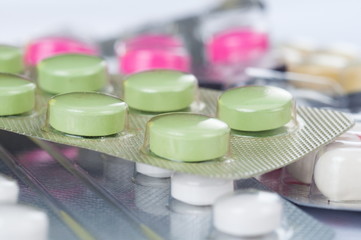 Pills of many shapes and colors