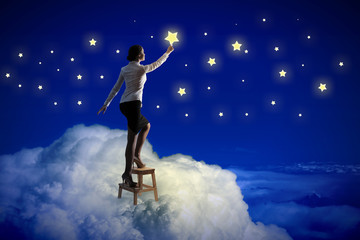 Woman lighting stars