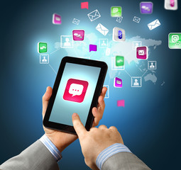 Close-up of hands holding tablet pc