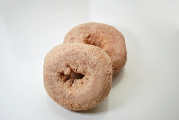 Two Cinnamon Covered Doughnuts