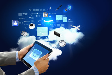 Close-up of hands holding tablet pc