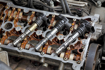 Ignition coil and gasoline engine with two camshafts