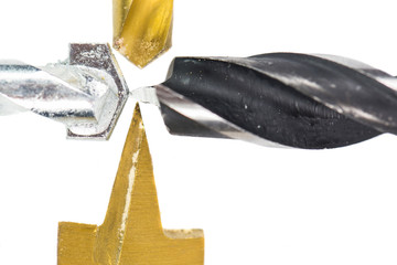 Various type of drill bits over white background