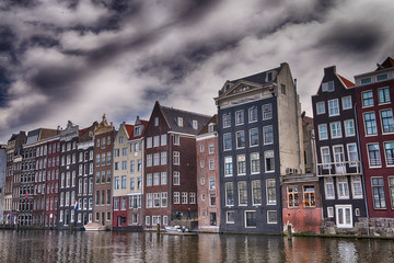 Amsterdam. Wonderful view of city canals and buildings in spring