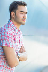 Fototapeta premium Profile - portrait od handsome thoughtful man with crossed arms