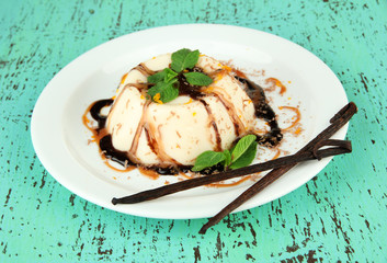 Panna Cotta with chocolate  and caramel sauce and vanilla