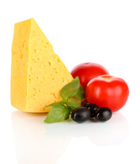 Cheese, basil and vegetables isolated on white