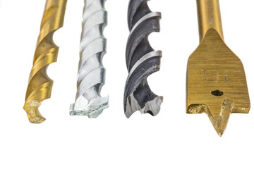 Various type of drill bits over white background
