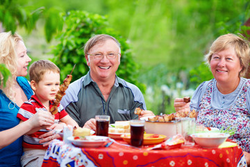 happy family together on picnic, summer outdoors