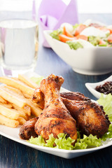Chicken drumsticks with prepared potatoes