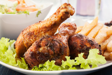 Chicken drumsticks with prepared potatoes