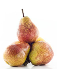 Mound of pears  in vertical direction on a white background