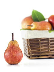 Pear with a basket full of pears on a white background