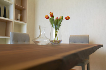 home interior decoration, vase of tulips on table