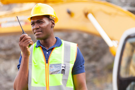 african american mine worker with walkie-talkie