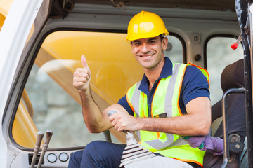 earthmover operator giving thumb up