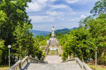 statue  Goddess of Mercy Kuan Yin in  mountains  Thailand