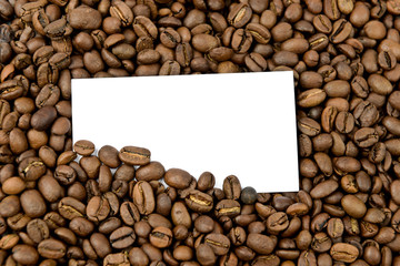 Coffee beans with a blank bussines card