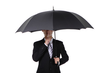 Business man asking for silence with umbrella