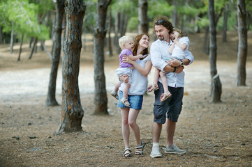 Family of four at summer day