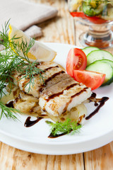roast fillet lemon sole with onion and vegetables