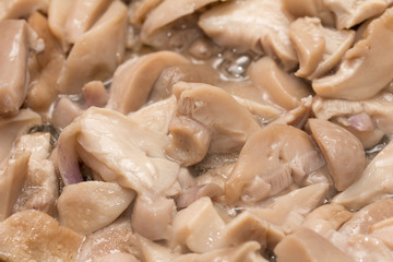 background of mushrooms fried in a pan