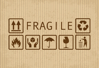 Set of fragile symbols on grunge cardboard