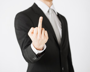 man showing middle finger