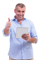 casual middle aged man with pad and ok sign